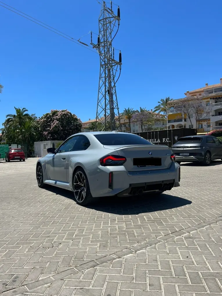 BMW M2 2024, exterior — Florence Luxury Car Rental, Florence. BMW M2 in Florence The 2024 BMW M2 is available for rental in Florence, providing a sport…