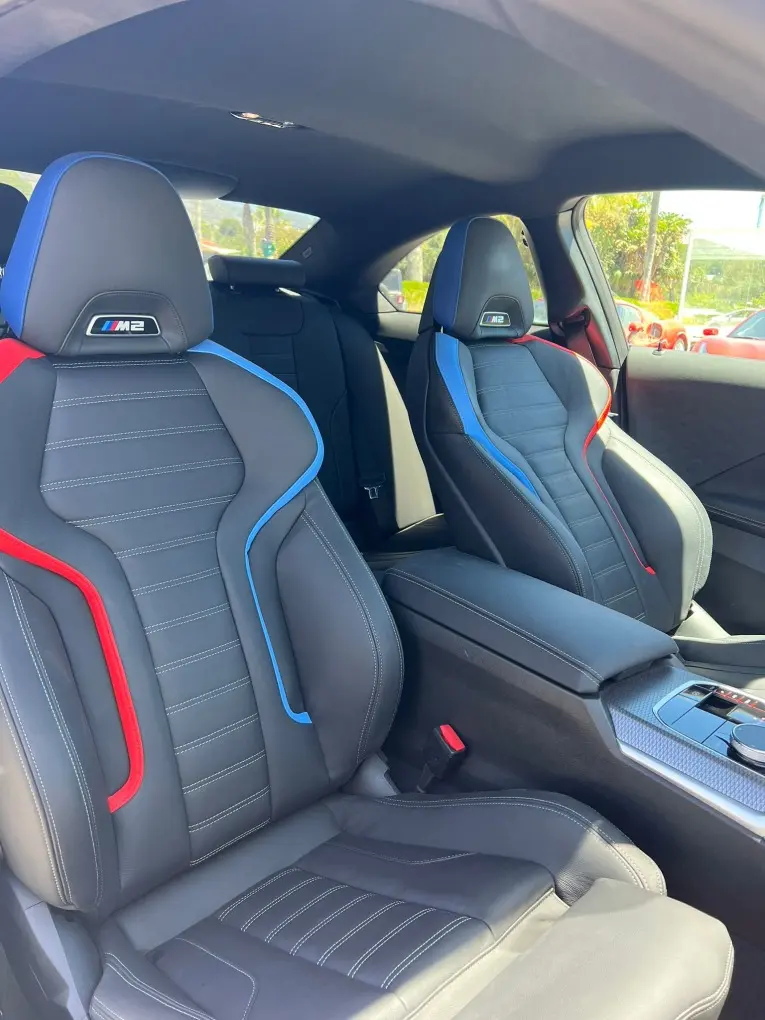 BMW M2 2024, rear view — Florence Luxury Car Rental, Florence. BMW M2 in Florence The 2024 BMW M2 is available for rental in Florence, providing a sport…