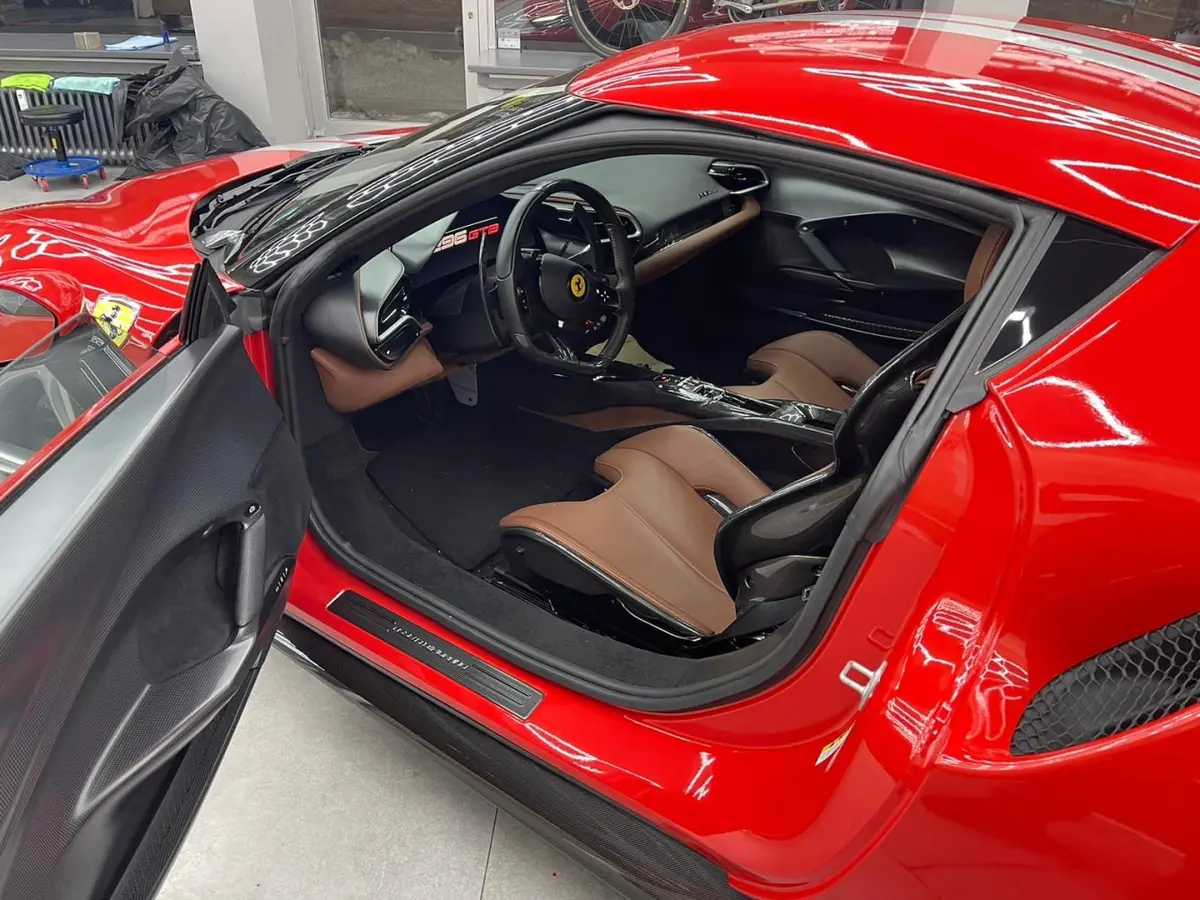 Ferrari 296 GTB 2023, rear view — Florence Luxury Car Rental, Florence. Ferrari 296 GTB in Florence Renting the 2023 Ferrari 296 GTB in Florence provides a…