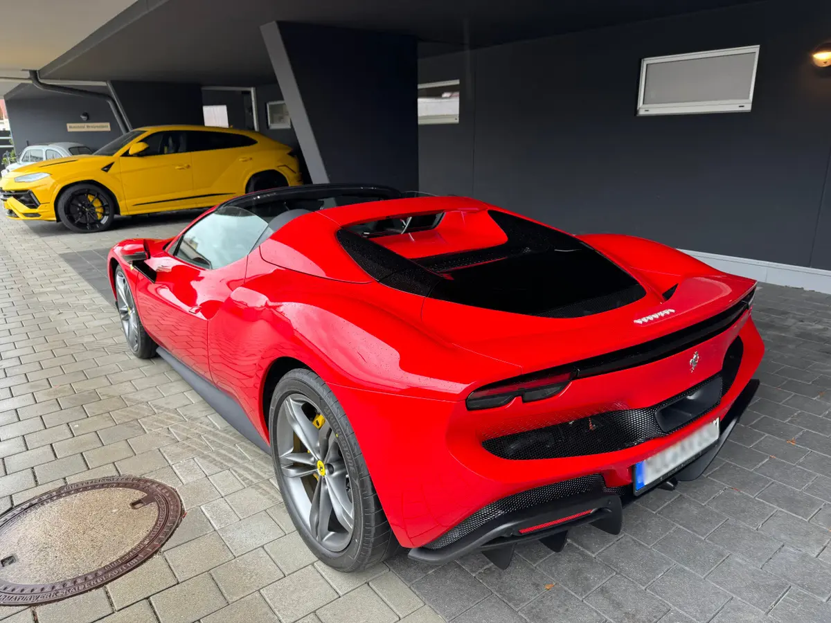 Ferrari 296 GTS Spider 2024, rear view — Florence Luxury Car Rental, Florence. Ferrari 296 GTS Spider in Florence Renting the 2024 Ferrari 296 GTS Spider in Florence…