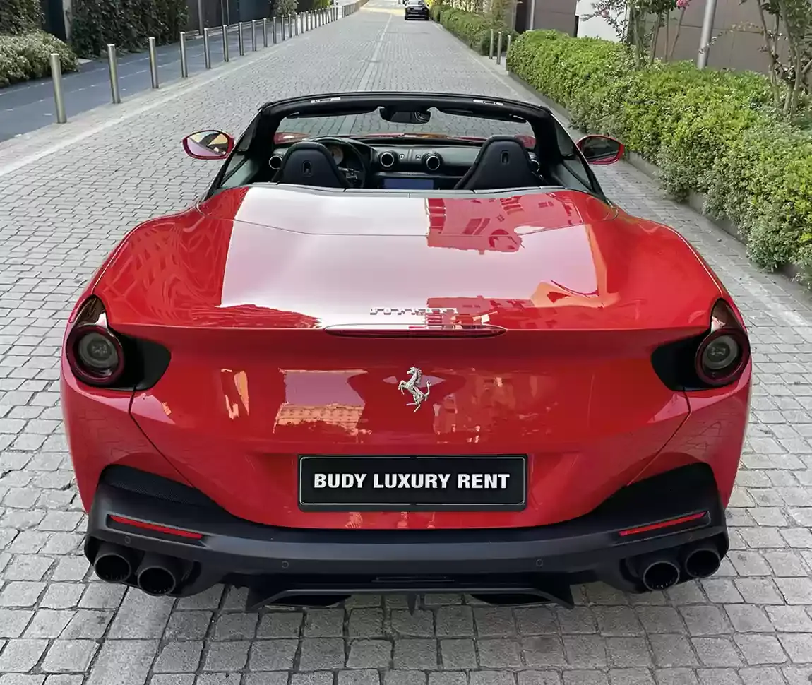 Ferrari Portofino M 2023, side profile — Florence Luxury Car Rental, Florence. Ferrari Portofino M in Florence Renting the 2023 Ferrari Portofino M in Florence provides…