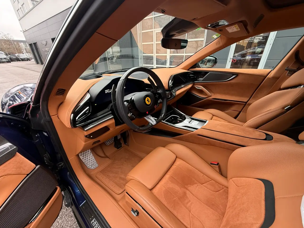 Ferrari Purosangue 2024, rear view — Florence Luxury Car Rental, Florence. Four seats, one hill road to Fiesole
