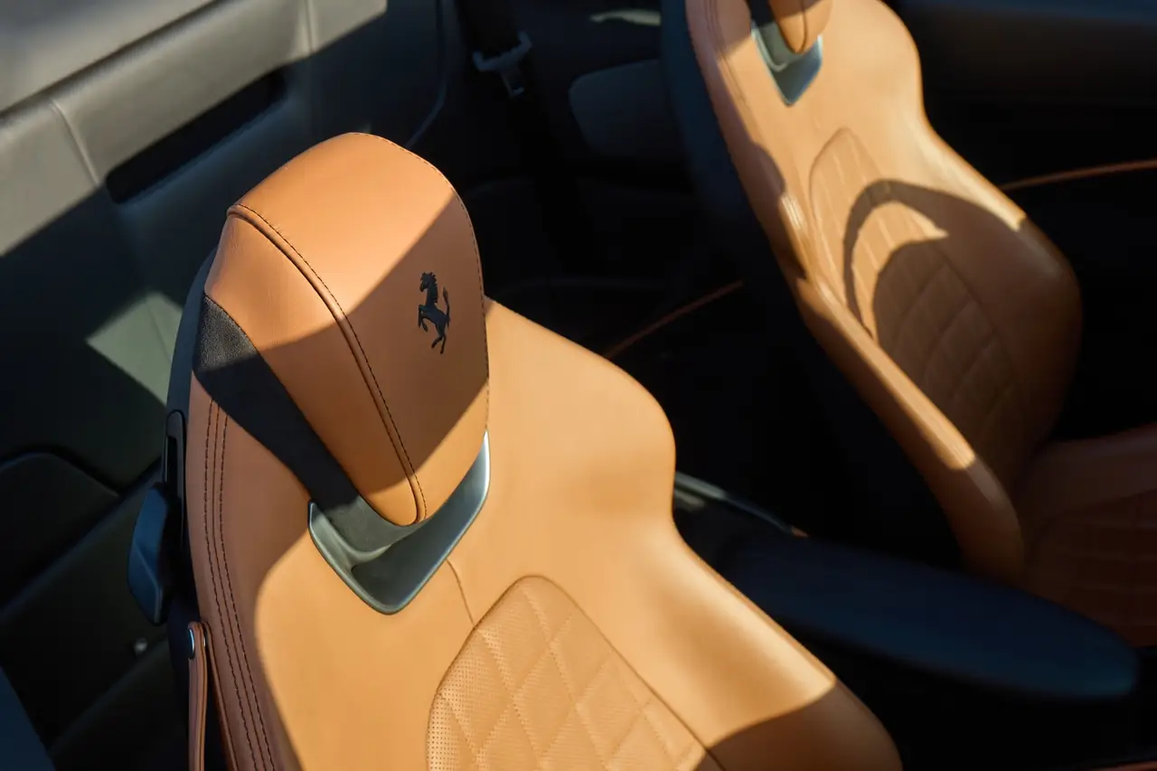 Ferrari Roma Spider 2024, interior — Florence Luxury Car Rental, Florence. Ferrari Roma Spider in Florence The 2024 Ferrari Roma Spider is available for rental in…