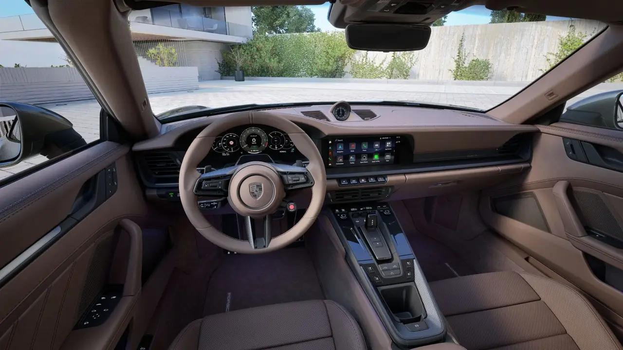 Porsche 911 992 Carrera Turbo S Cabrio 2026, rear view — Florence Luxury Car Rental, Florence. Porsche 911 992 Carrera Turbo S Cabrio in Florence Renting the 2026 Porsche 911 992…