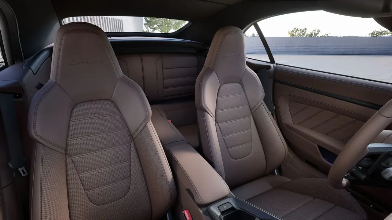 Porsche 911 992 Carrera Turbo S Cabrio 2026, interior — Florence Luxury Car Rental, Florence. Porsche 911 992 Carrera Turbo S Cabrio in Florence Renting the 2026 Porsche 911 992…