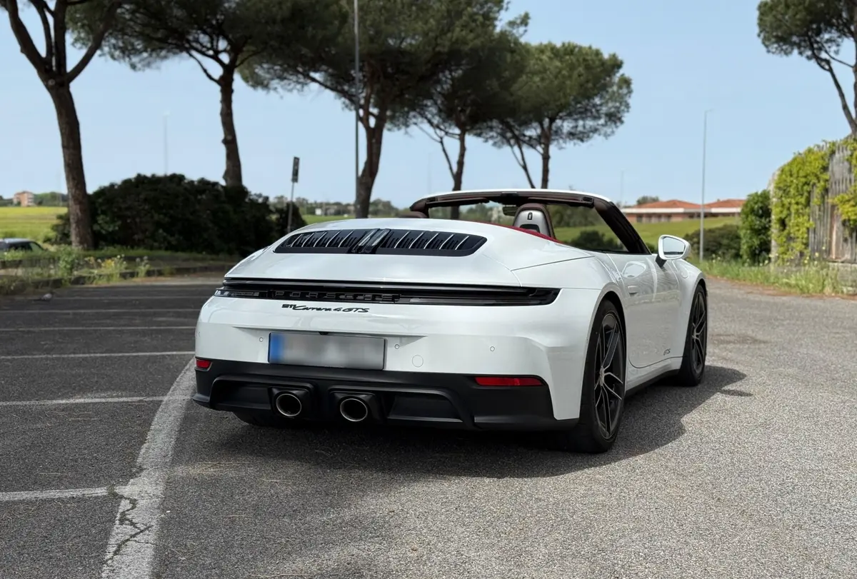 Porsche 992.2 Carrera 4 GTS Cabrio 2025, rear view — Florence Luxury Car Rental, Florence. Porsche 992.2 Carrera 4 GTS Cabrio in Florence Renting the 2025 Porsche 992.2 Carrera 4…