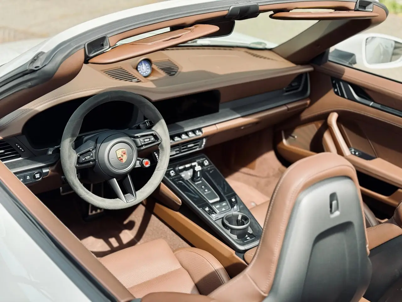 Porsche 992.2 Carrera 4 GTS Cabrio 2025, interior — Florence Luxury Car Rental, Florence. Porsche 992.2 Carrera 4 GTS Cabrio in Florence Renting the 2025 Porsche 992.2 Carrera 4…