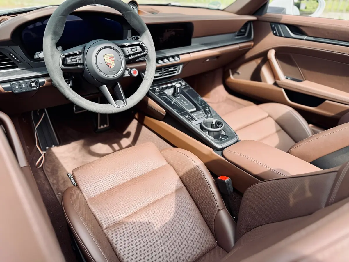 Porsche 992.2 Carrera 4 GTS Cabrio 2025, dashboard — Florence Luxury Car Rental, Florence. Porsche 992.2 Carrera 4 GTS Cabrio in Florence Renting the 2025 Porsche 992.2 Carrera 4…