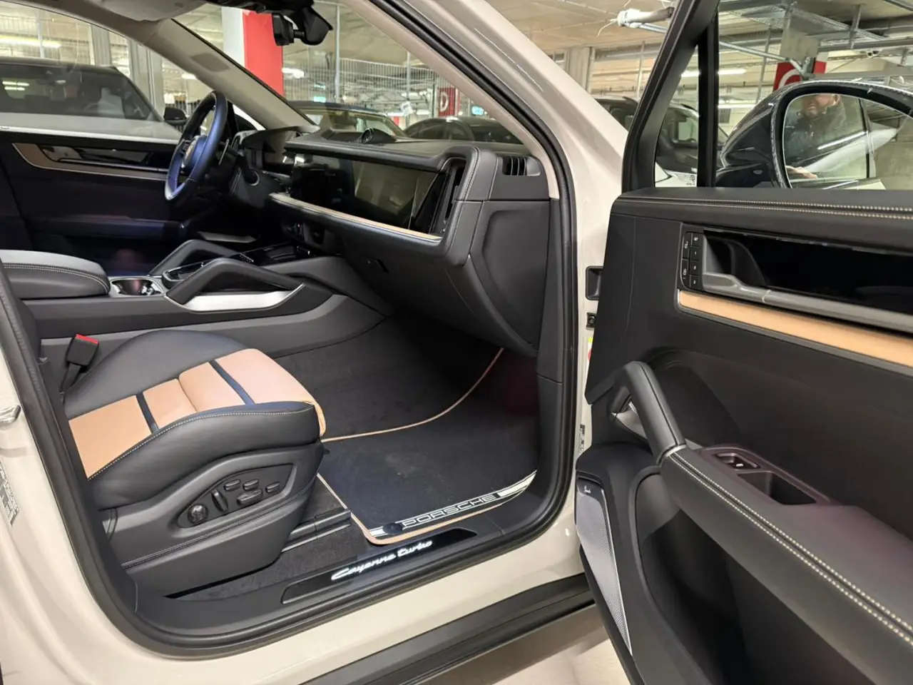 Porsche Cayenne Turbo E-Hybrid Coupé GT 2026, rear view — Florence Luxury Car Rental, Florence. Porsche Cayenne Turbo E-Hybrid Coupé GT in Florence Renting the 2026 Porsche Cayenne…